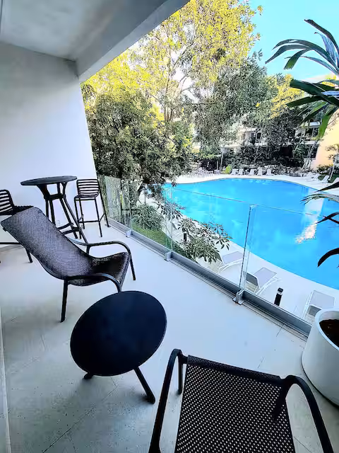 Condo moderno en Playacar con vistas a la piscina