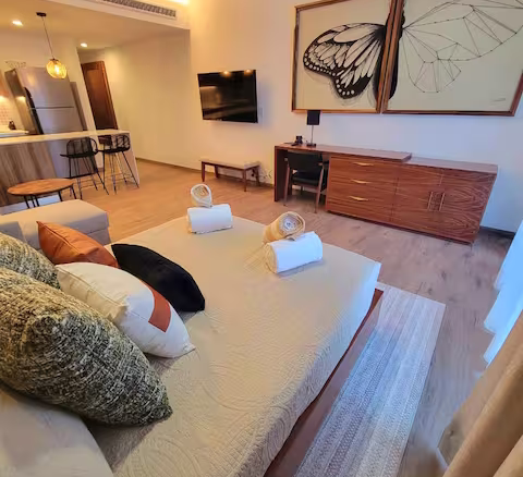 Condo moderno en Playacar con vistas a la piscina